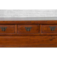 Chinese Elm Three-Drawer Kang Cabinet with Everted Flanges and Carved Spandrels