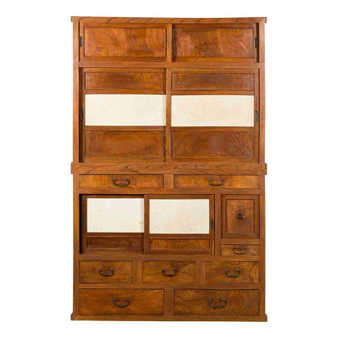 Japanese Meiji period kiri wood two-part kitchen cabinet in the Kanto style with sliding doors, parchment paper and drawers