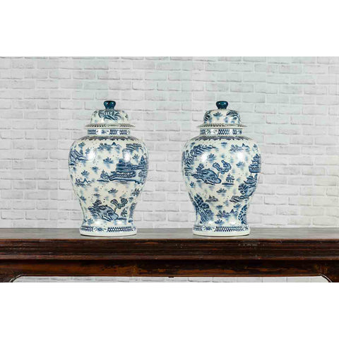 Pair of Vintage Chinese Blue and white Porcelain Temple Jars with Architectures