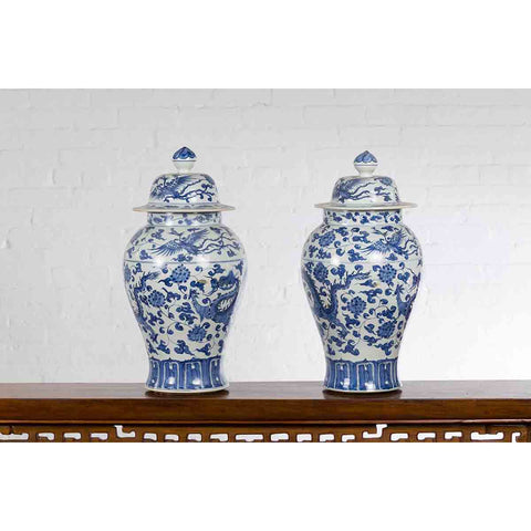 Pair of Vintage Chinese Blue and white Porcelain Lidded Jars with Dragon Motifs