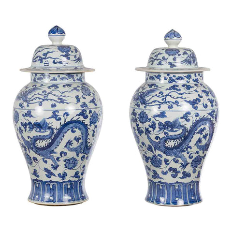 Pair of Vintage Chinese Blue and white Porcelain Lidded Jars with Dragon Motifs for sale at FEA Home