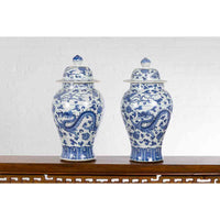 Pair of Vintage Chinese Blue and white Porcelain Lidded Jars with Dragon Motifs