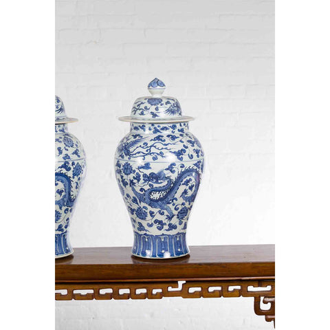 Pair of Vintage Chinese Blue and white Porcelain Lidded Jars with Dragon Motifs