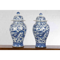 Pair of Vintage Chinese Blue and white Porcelain Lidded Jars with Dragon Motifs