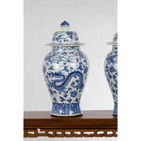 Pair of Vintage Chinese Blue and white Porcelain Lidded Jars with Dragon Motifs