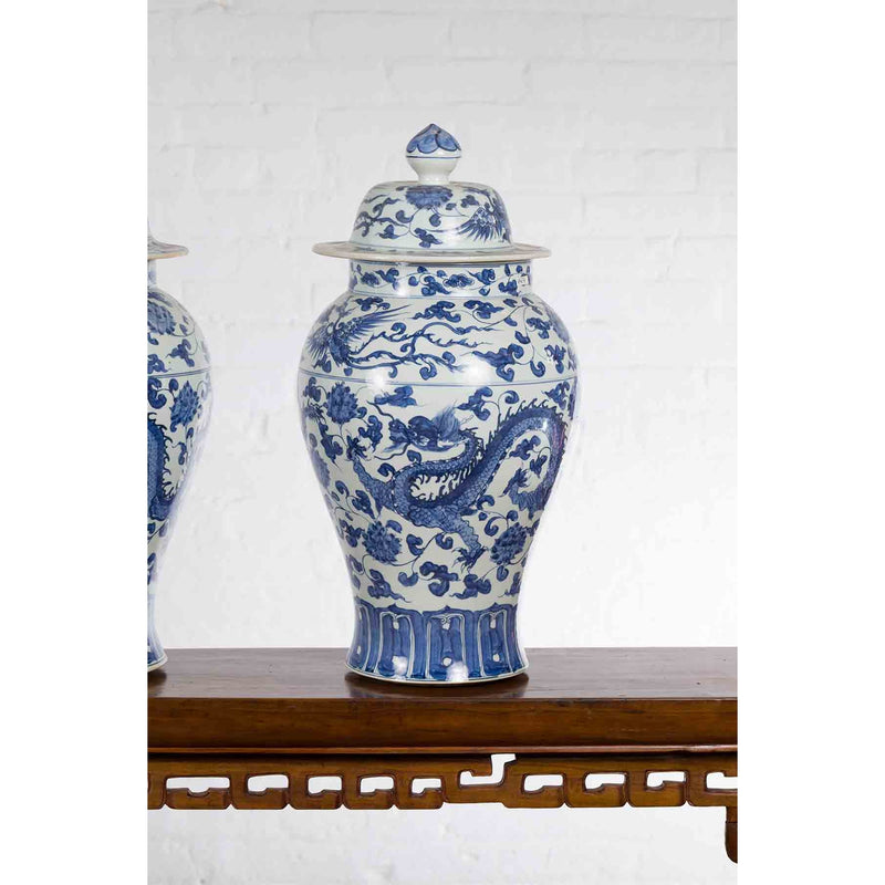 Pair of Vintage Chinese Blue and white Porcelain Lidded Jars with Dragon Motifs