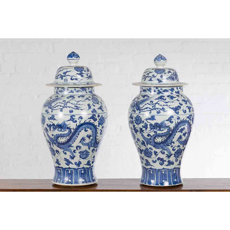 Pair of Vintage Chinese Blue and white Porcelain Lidded Jars with Dragon Motifs