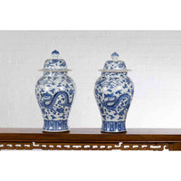 Pair of Vintage Chinese Blue and white Porcelain Lidded Jars with Dragon Motifs