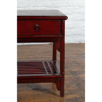 Chinese Vintage Oxblood Lacquer Side Table with Two Drawers and Fretwork Shelf
