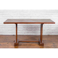 Antique Indonesian Teakwood Dining Table with Trestle Base and Brown Patina