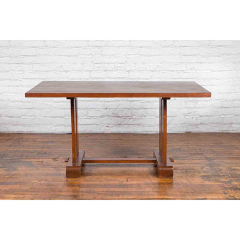 Antique Indonesian Teakwood Dining Table with Trestle Base and Brown Patina