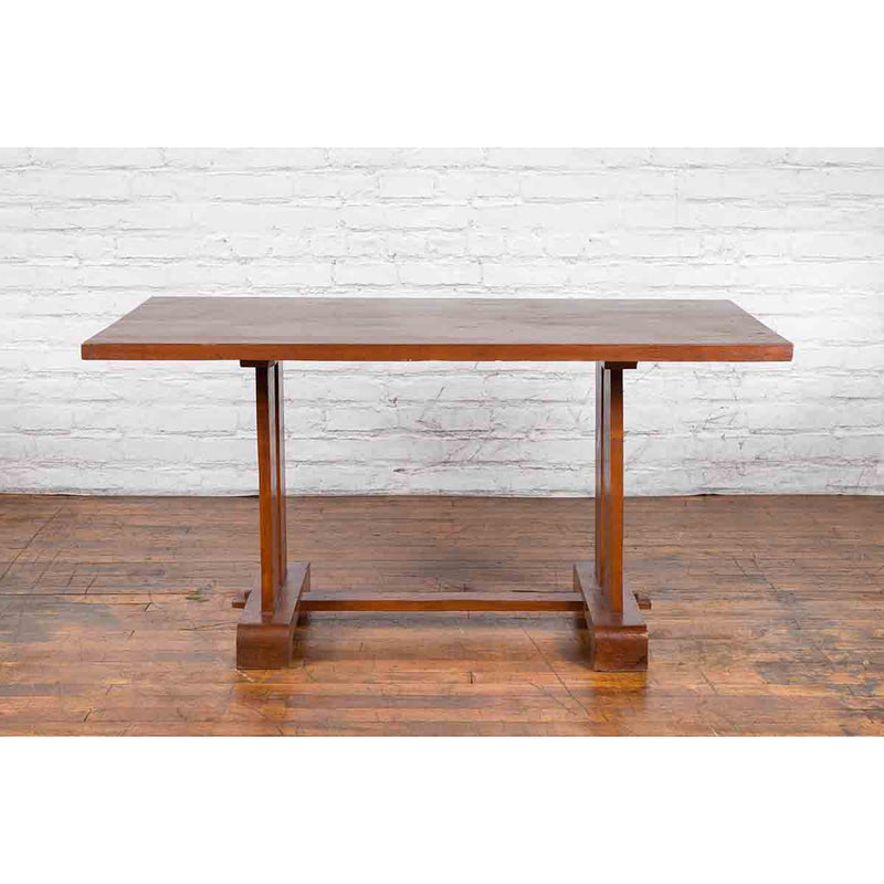 Antique Indonesian Teakwood Dining Table with Trestle Base and Brown Patina