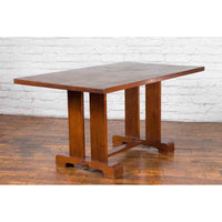 Antique Indonesian Teakwood Dining Table with Trestle Base and Brown Patina