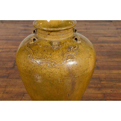 Chinese Antique Martaban Water Jar with Dragon Motifs and Ocher Glaze