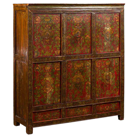 Tibetan hand-painted cabinet from the 19th century, with two pairs of doors and floral motifs
