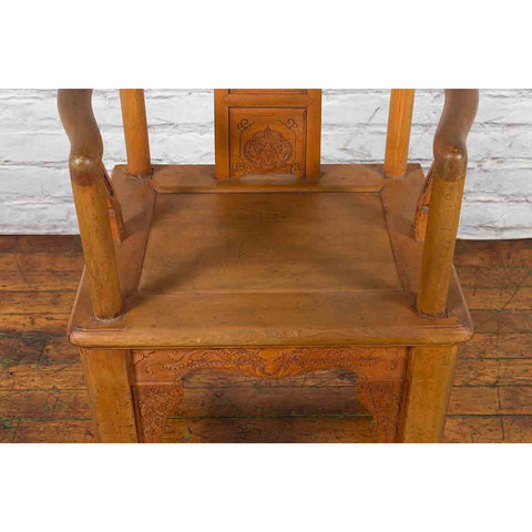 Chinese 19th Century Qing Dynasty Elm Armchair with Carved Traditional Motifs