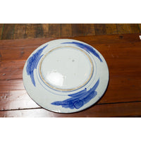 19th Century Japanese Porcelain Plate with Hand-Painted Blue and White Décor