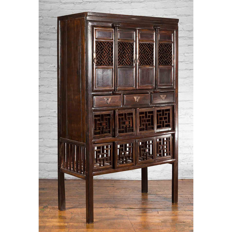 Chinese Qing 19th Century Brown Cabinet with Fretwork Doors and Three Drawers