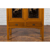 Chinese Early 20th Century Lacquered Armoire with Gilt Carved Warrior Motifs