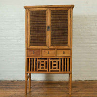 Indonesian Cabinet with Rattan Doors, Drawers and Fretwork Sliding Panels