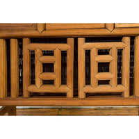 Indonesian Cabinet with Rattan Doors, Drawers and Fretwork Sliding Panels