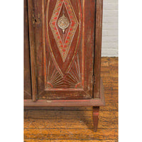 Antique Indonesian Wooden Cabinet with Carved and Painted Geometric Motifs