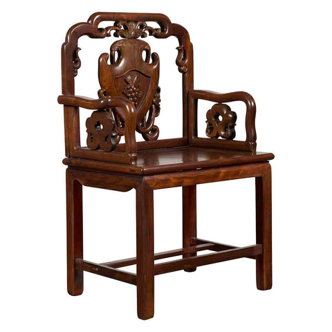 Chinese Qing Dynasty period rosewood armchair from the 19th century, with hand carved splat and arm supports