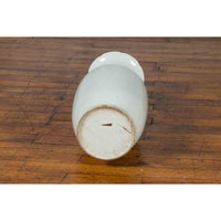 Chinese Vintage Blanc de Chine White Porcelain Vase with Decorative Motifs