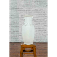 Chinese Vintage Blanc de Chine White Porcelain Vase with Decorative Motifs