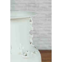 Chinese Vintage Blanc de Chine White Porcelain Vase with Decorative Motifs