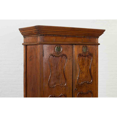 Indonesian Early 20th Century Carved Teak Wood Cabinet with Molded Cartouches