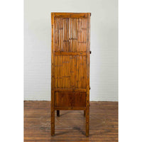 Chinese Vintage Wood and Bamboo Cabinet with Double Doors and Openwork Apron