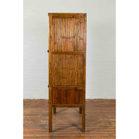 Chinese Vintage Wood and Bamboo Cabinet with Double Doors and Openwork Apron