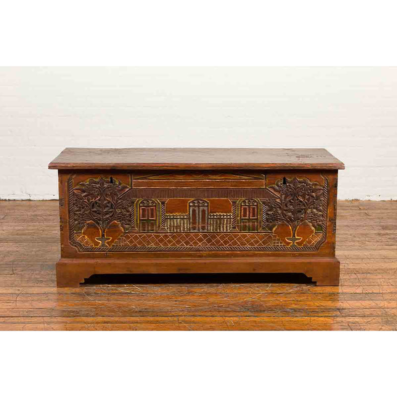 Indonesian 19th Century Carved and Painted Trunk with Architecture and Foliage