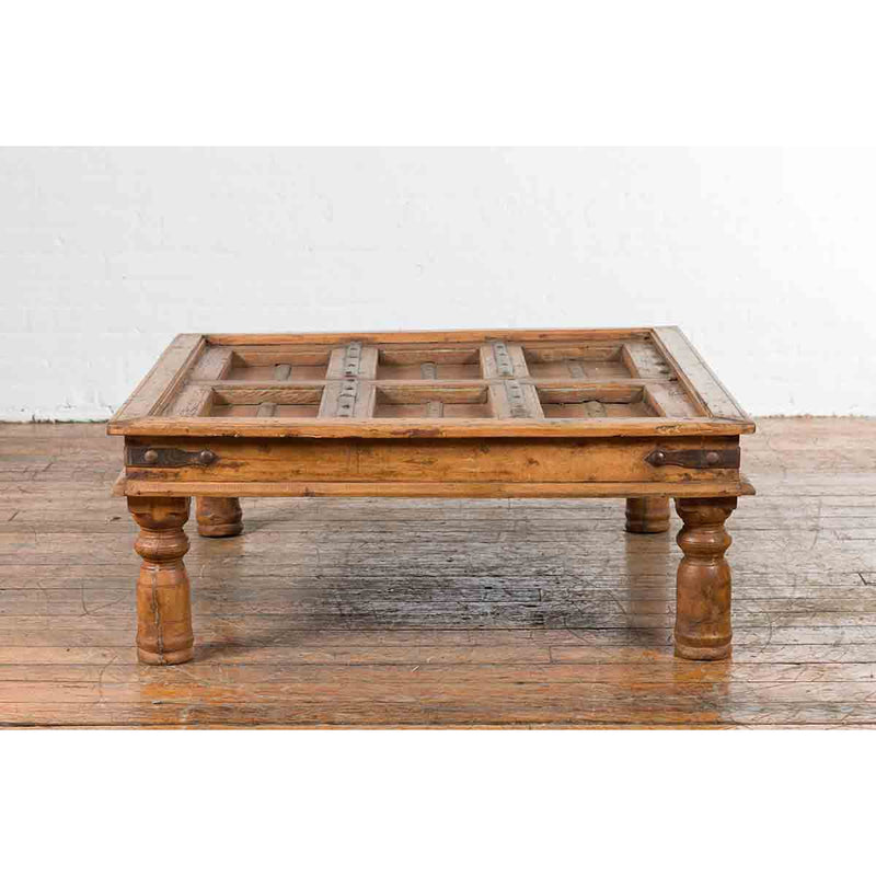 19th Century Indian Paneled Door with Iron Accents Converted into a Coffee Table
