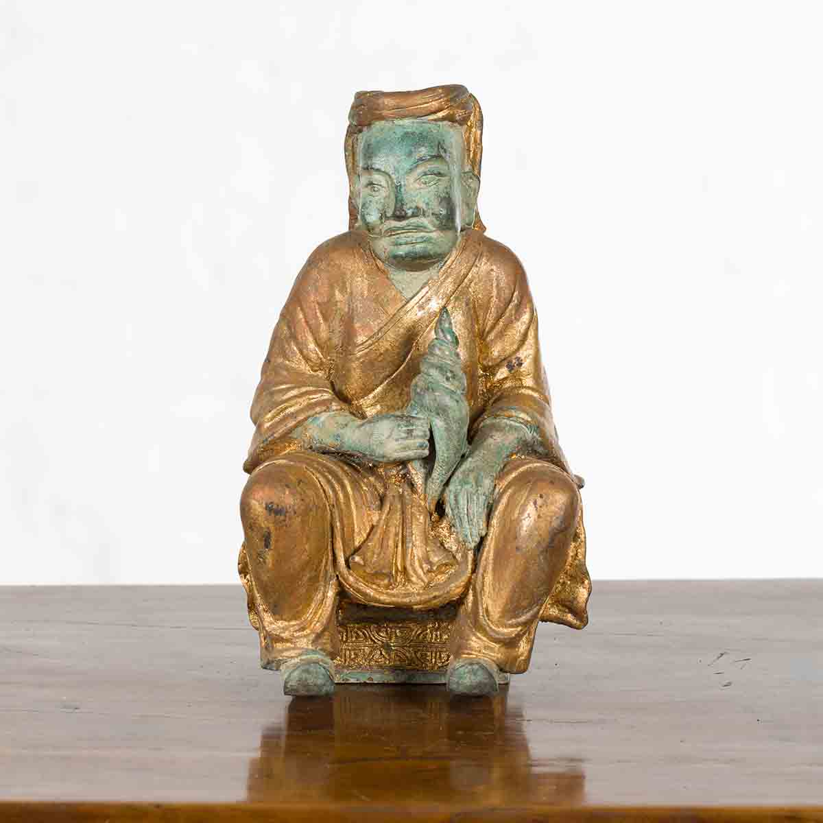 Petite Thai Verde and Gilded Statuette of a Seated Monk Holding a Conch Shell-2. Asian & Chinese Furniture, Art, Antiques, Vintage Home Décor for sale at FEA Home