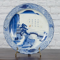 19th Century Japanese Porcelain Imari Plate with Painted Blue and White Décor