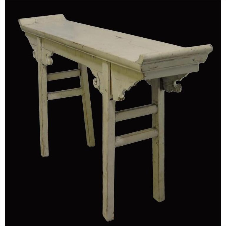 Distressed light wood altar table with curved ends and carved supports, antique finish, front view.