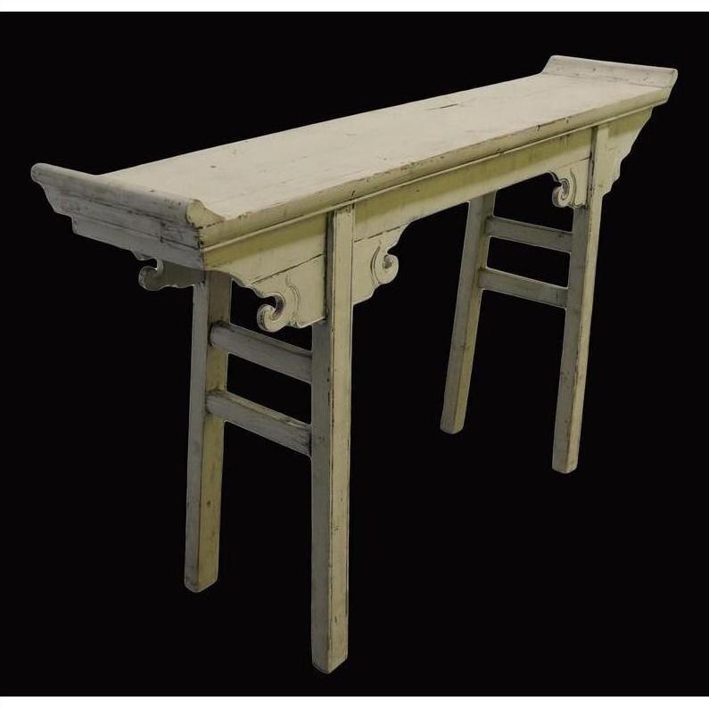 Wood altar table with curved supports and splayed legs, vintage style, against a solid black background.