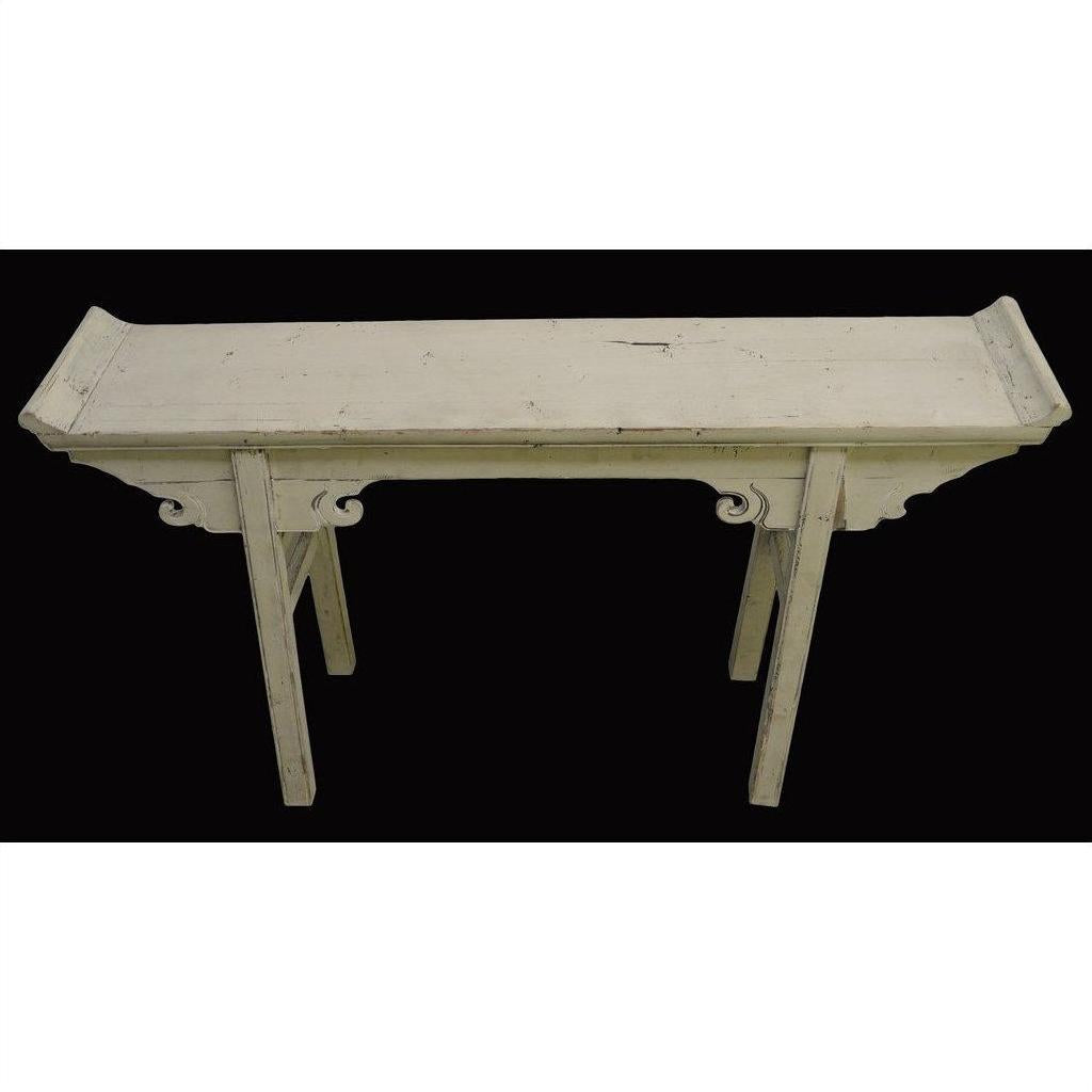 Distressed white antique wood altar table with curved side accents, narrow profile, front view.