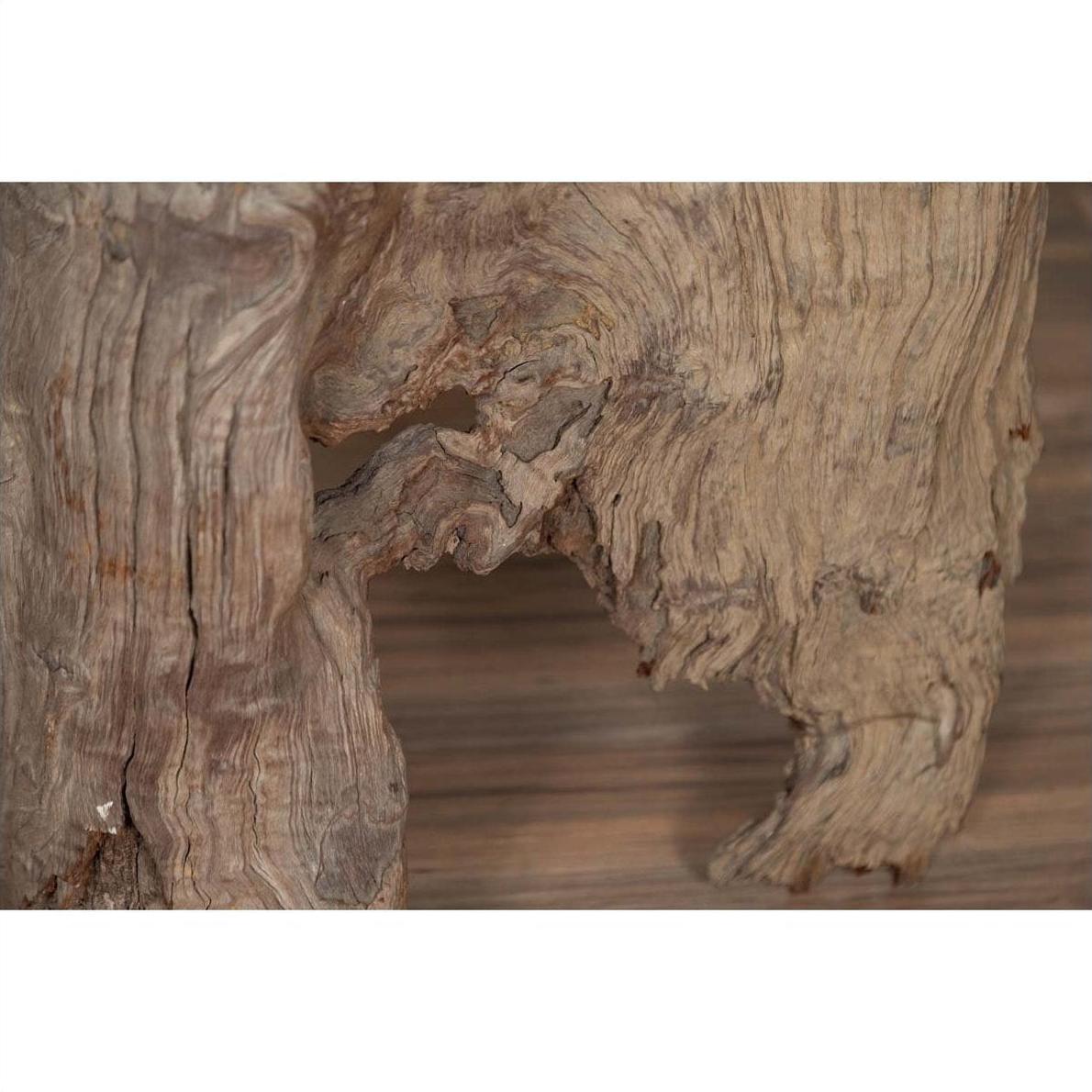 Brown driftwood carving close-up with natural grooves, wood material from Chiang Mai, Northern Thailand.