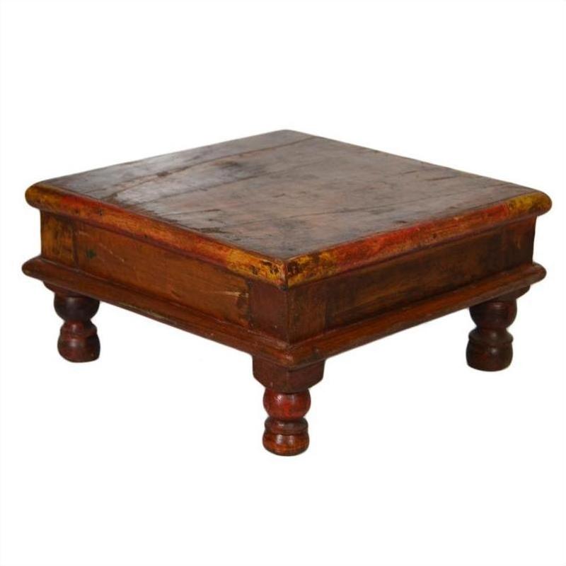 Brown wooden square coffee table with short round legs and weathered finish, antique Asian style.