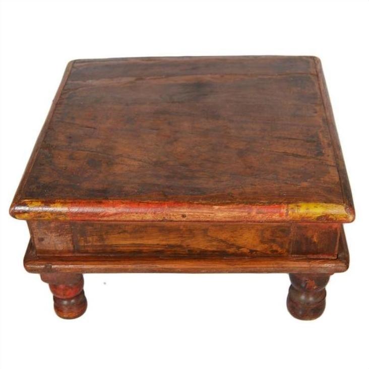 Brown wooden antique Asian prayer or coffee table, small and square with short legs and rustic, worn finish.