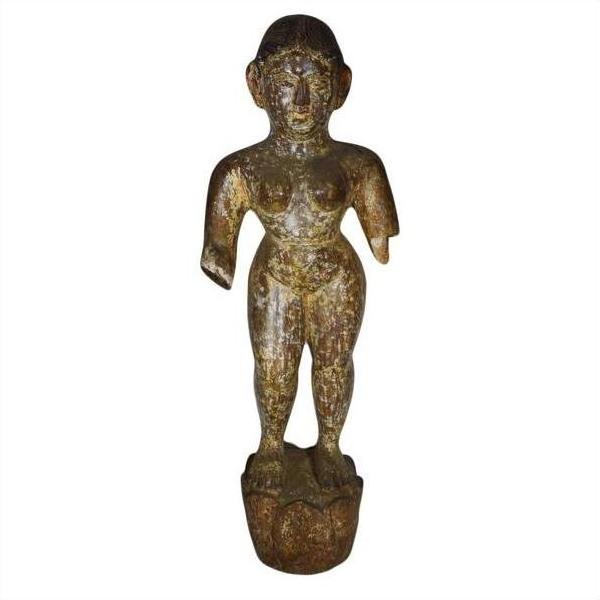 Weathered wooden Burmese temple carving, armless figure on pedestal, aged surface, white background.