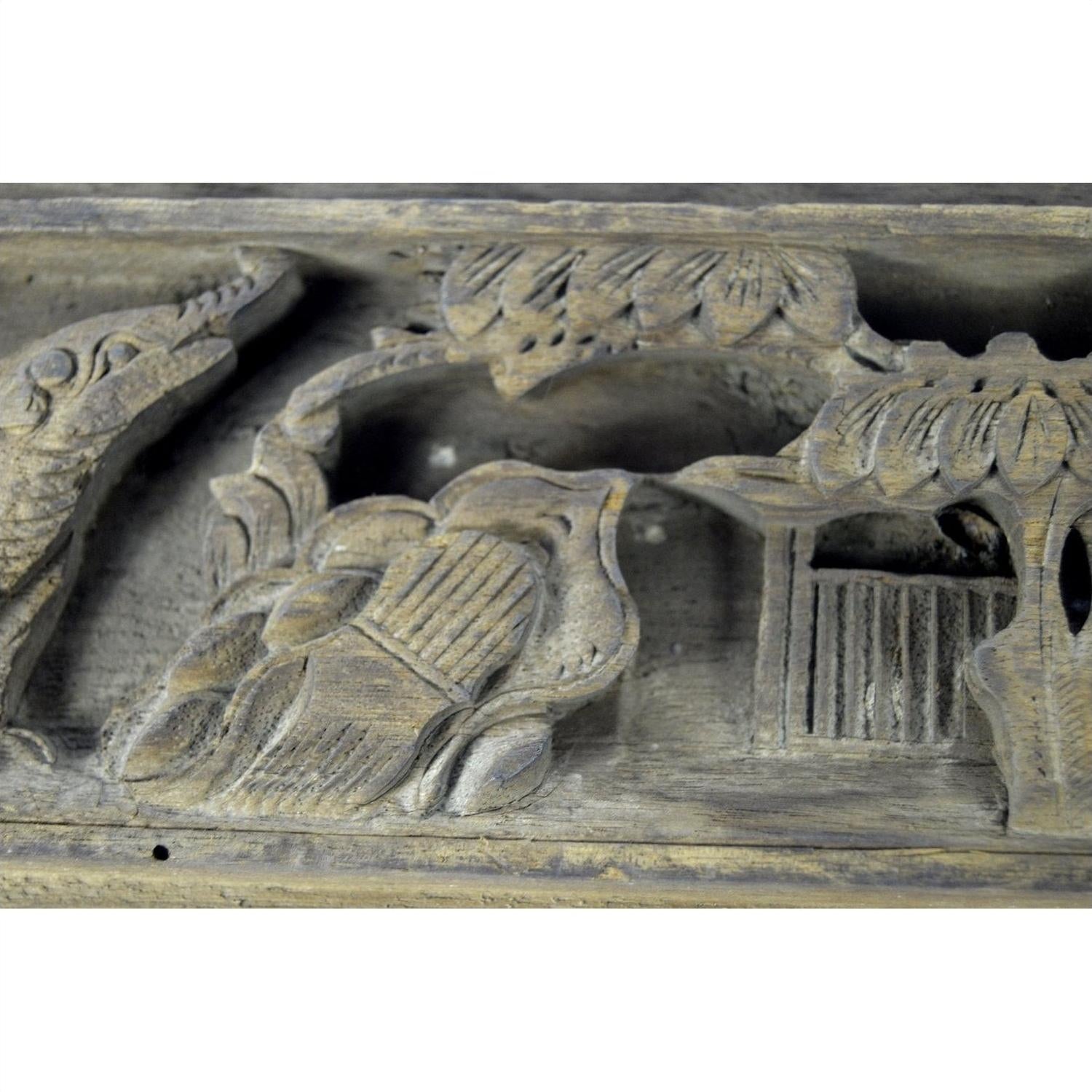 Close-up of antique wooden Chinese temple plaque with intricate floral pattern and house motif, 12x4x1, good condition.