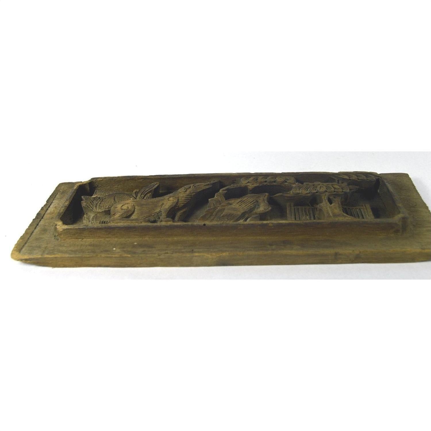 Brown wood Chinese temple plaque with carved fish and foliage, rectangular, close-up, good condition.