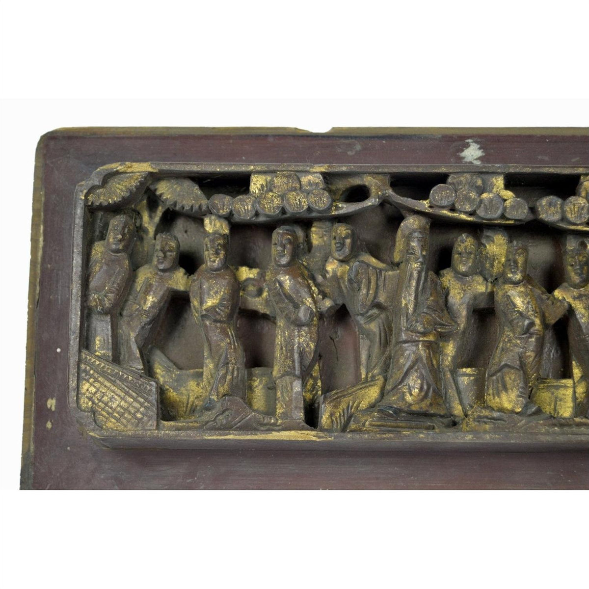 Brown wood carved Chinese temple plaque in frame, decorative wall art panel, close-up view.