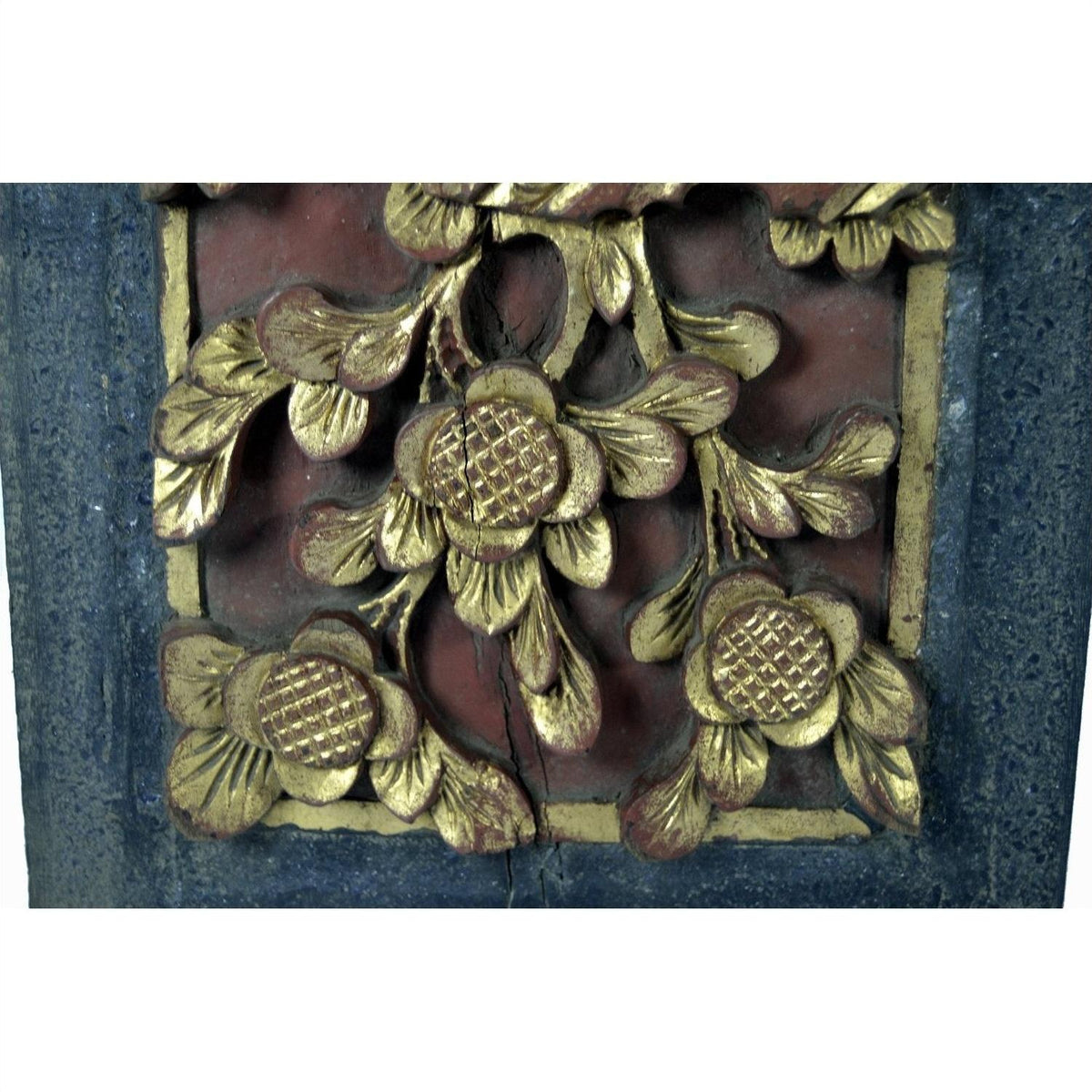 Close-up of gold floral carved antique Chinese wedding bed plaque on red and dark background, 11.5 x 6 x 0.75 inches.