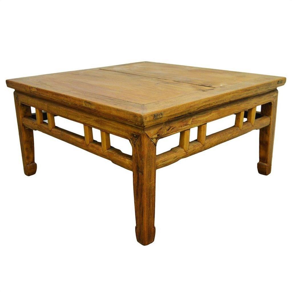Light brown lacquered wood square Chinese coffee table with sturdy legs and simple carved stretcher details.
