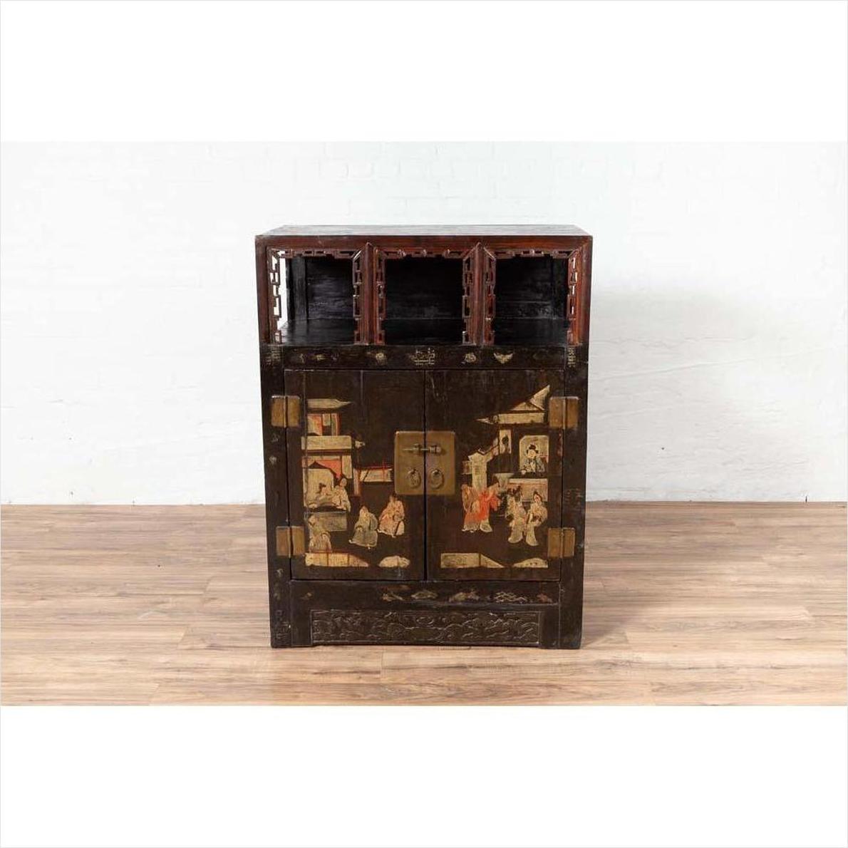 Brown wood Chinese display cabinet with hand painted chinoiserie and open shelf on wooden floor.